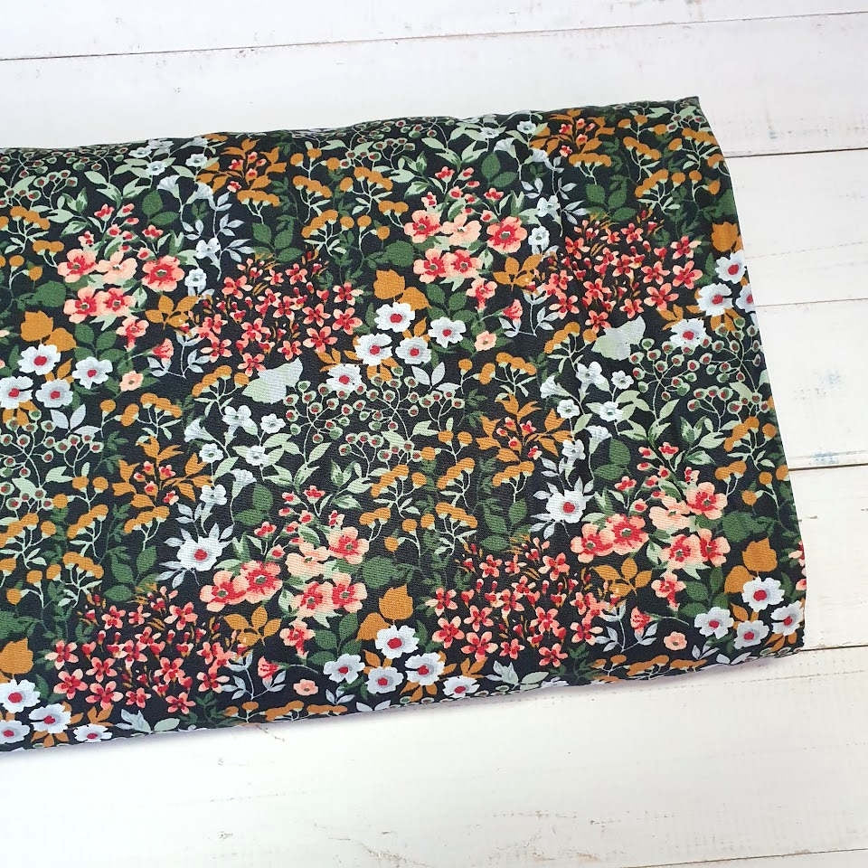 Baumwollstoff Streublümchen grün